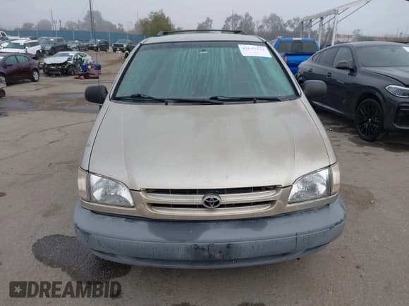 ✅ 2000 Toyota Sienna LE • VIN: 4T3ZF13C0YU238438 • Lot: 43619973. Listed on IAAI with 148,471 mi. Free auction sales archive from the USA and detailed vehicle history report at DreamBid. Image 12.