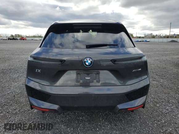 ✅ 2022 BMW iX xDrive50 • VIN: WB523CF00NCK53524 • Лот: 85099975. Опубликован ранее на Copart с пробегом 108 891 миль. Бесплатный доступ к архиву аукционных продаж из США и подробный отчёт об истории автомобиля на DreamBid. Изображение 6.