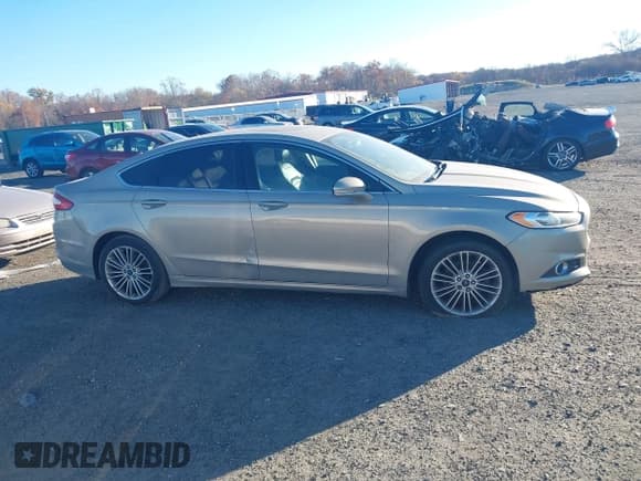 ✅ 2016 Ford Fusion SE • VIN: 3FA6P0T92GR100553 • Lot: 43512085. Wystawiony na IAAI z przebiegiem 205 222 mil. Bezpłatny archiwum sprzedaży aukcyjnych z USA i szczegółowy raport historii pojazdu na DreamBid. Zdjęcie 12.
