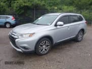 ✅ 2016 Mitsubishi Outlander SE • VIN: JA4AZ3A33GZ044076 • Lot: 42267545. Listed on IAAI with 153,340 mi. Free auction sales archive from the USA and detailed vehicle history report at DreamBid. Image 18.