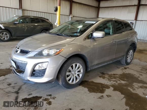 ✅ 2012 Mazda CX-7 i Touring • VIN: JM3ER2CM8C0415326 • Lot: 86450424. Wystawiony na Copart z przebiegiem 82 810 mil. Bezpłatny archiwum sprzedaży aukcyjnych z USA i szczegółowy raport historii pojazdu na DreamBid. Zdjęcie 1.