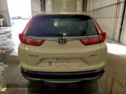 ✅ 2017 Honda CR-V EX • VIN: 5J6RW2H55HL064766 • Лот: 92501095. Опубликован ранее на Copart с пробегом 104 570 миль. Бесплатный доступ к архиву аукционных продаж из США и подробный отчёт об истории автомобиля на DreamBid. Изображение 6.