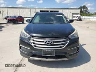 2018 Hyundai Santa Fe 2.4L z VIN 5NMZT3LB1JH071416, wystawiony jako Copart lot #56718425 z przebiegiem 134 004 mil mil oraz Szkoda całkowita • Salvage title. Historia ofert i sprzedaży dostępna na DreamBid. Obrazek 5.