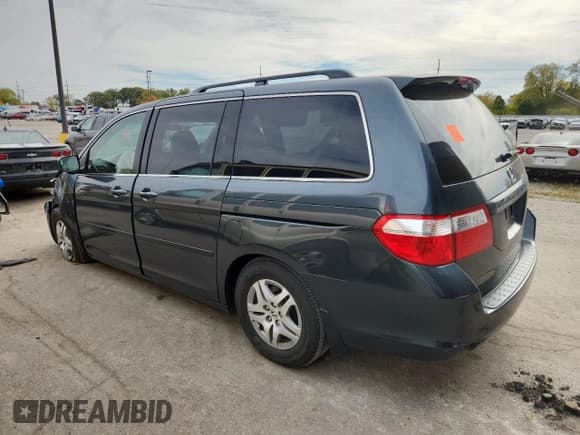✅ 2005 Honda Odyssey EX-L • VIN: 5FNRL38695B069173 • Lot: 82425035. Listed on Copart with 174,934 mi. Free auction sales archive from the USA and detailed vehicle history report at DreamBid. Image 2.