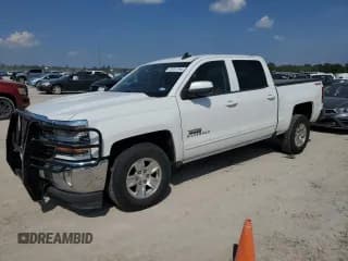✅ 2018 Chevrolet Silverado 1500 LT • VIN: 3GCUKREC8JG601897 • Лот: 72721394. Опубликован ранее на Copart с пробегом 143 452 миль. Бесплатный доступ к архиву аукционных продаж из США и подробный отчёт об истории автомобиля на DreamBid. Изображение 1.