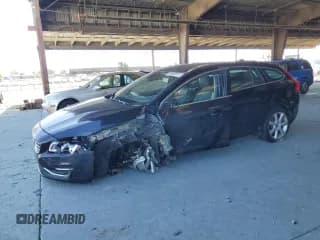 ✅ 2016 Volvo V60 T5 Drive-E Premier • VIN: YV140MEK0G1306407 • Лот: 69506515. Опубликован ранее на Copart с пробегом 107 630 миль. Бесплатный доступ к архиву аукционных продаж из США и подробный отчёт об истории автомобиля на DreamBid. Изображение 1.