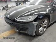 ✅ 2013 Tesla Model S • VIN: 5YJSA1CN2DFP27277 • Lot: 42971436. Listed on IAAI with Not provided. Free auction sales archive from the USA and detailed vehicle history report at DreamBid. Image 6.