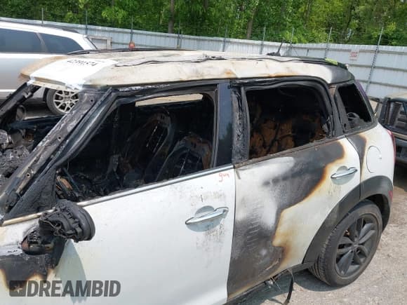 ✅ 2014 MINI Countryman • VIN: WMWZB3C5XEWR42262 • Lot: 42391574. Listed on IAAI with Not provided. Free auction sales archive from the USA and detailed vehicle history report at DreamBid. Image 6.