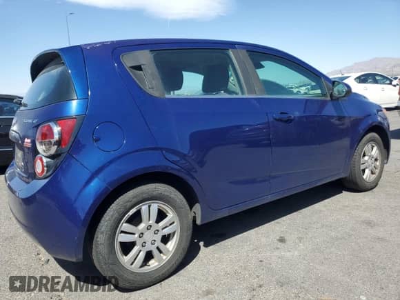 2013 Chevrolet Sonic LT z VIN 1G1JD6SB5D4196566, wystawiony jako Copart lot #56134285 z przebiegiem 233 825 mil mil oraz Szkoda całkowita • Salvage title. Historia ofert i sprzedaży dostępna na DreamBid. Obrazek 3.