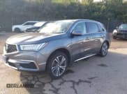 ✅ 2019 Acura MDX Technology • VIN: 5J8YD4H55KL018060 • Lot: 43255772. Wystawiony na IAAI z przebiegiem 63 655 mil. Bezpłatny archiwum sprzedaży aukcyjnych z USA i szczegółowy raport historii pojazdu na DreamBid. Zdjęcie 18.