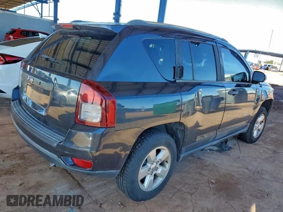 ✅ 2014 Jeep Compass Sport • VIN: 1C4NJCBAXED725910 • Lot: 93786035. Listed on Copart with 107,972 mi. Free auction sales archive from the USA and detailed vehicle history report at DreamBid. Image 3.