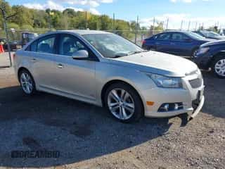 2013 Chevrolet Cruze LTZ z VIN 1G1PG5SB1D7120028, wystawiony jako IAAI lot #43409983 z przebiegiem 232 025 mil mil oraz . Historia ofert i sprzedaży dostępna na DreamBid. Obrazek 1.