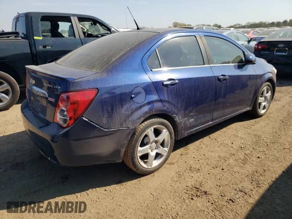 2014 Chevrolet Sonic LTZ с VIN 1G1JE5SB1E4177537, выставлен на аукционе Copart как лот 72123994 с пробегом 116 424 миль миль и Списание • Salvage title. История ставок и продаж доступна на DreamBid. Изображение 3.