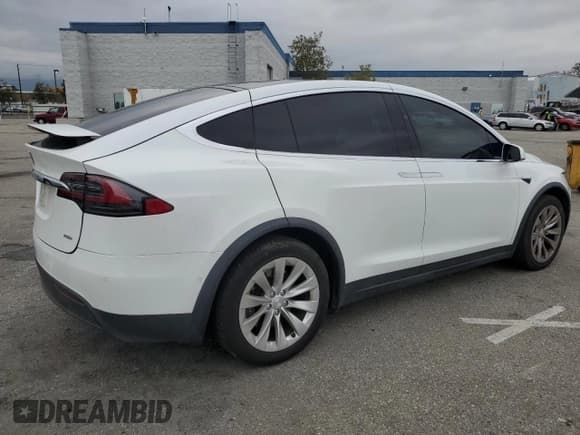 ✅ 2018 Tesla Model X 75D • VIN: 5YJXCAE26JF111662 • Lot: 54129765. Listed on Copart with 88,553 mi. Free auction sales archive from the USA and detailed vehicle history report at DreamBid. Image 3.
