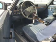 ✅ 1986 Mercedes-Benz 560 SL • VIN: WDBBA48D6GA045743 • Lot: 78776564. Wystawiony na Copart z przebiegiem 116 013 mil. Bezpłatny archiwum sprzedaży aukcyjnych z USA i szczegółowy raport historii pojazdu na DreamBid. Zdjęcie 8.