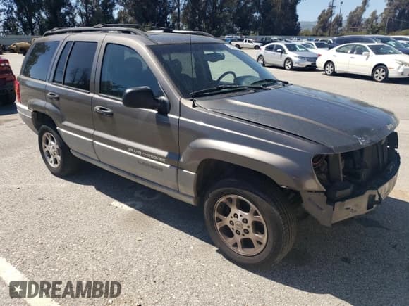 ✅ 1999 Jeep Grand Cherokee Laredo • VIN: 1J4G258S6XC606420 • Лот: 49896105. Опубликован ранее на Copart с пробегом 170 904 миль. Бесплатный доступ к архиву аукционных продаж из США и подробный отчёт об истории автомобиля на DreamBid. Изображение 4.