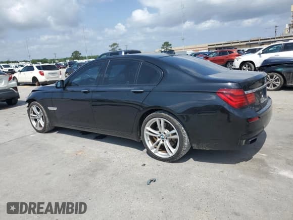 ✅ 2014 BMW 7 Series 740i • VIN: WBAYA6C53ED143998 • Lot: 54122055. Listed on Copart with 149,519 mi. Free auction sales archive from the USA and detailed vehicle history report at DreamBid. Image 2.