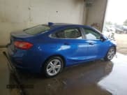 ✅ 2016 Chevrolet Cruze LT • VIN: 1G1BE5SM9G7248250 • Lot: 51963423. Listed on Copart with 119,545 mi. Free auction sales archive from the USA and detailed vehicle history report at DreamBid. Image 3.