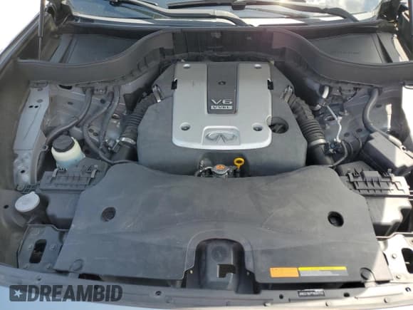 ✅ 2015 Infiniti QX70 • VIN: JN8CS1MU7FM380700 • Lot: 61938375. Listed on Copart with 88,928 mi. Free auction sales archive from the USA and detailed vehicle history report at DreamBid. Image 11.