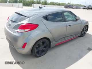 2014 Hyundai Veloster z VIN KMHTC6AD1EU182487, wystawiony jako IAAI lot #43479609 z przebiegiem 71 862 mil mil oraz . Historia ofert i sprzedaży dostępna na DreamBid. Obrazek 4.