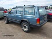 ✅ 1998 Jeep Cherokee Sport • VIN: 1J4FJ68S0WL269553 • Lot: 42207389. Listed on IAAI with 261,377 mi. Free auction sales archive from the USA and detailed vehicle history report at DreamBid. Image 3.