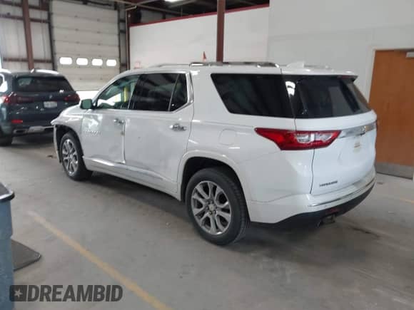 2018 Chevrolet Traverse Premier с VIN 1GNERKKW0JJ101552, выставлен на аукционе IAAI как лот 42609036 с пробегом 130 667 миль миль и . История ставок и продаж доступна на DreamBid. Изображение 3.