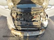 ✅ 2013 Ford Fiesta SE • VIN: 3FADP4BJ3DM170839 • Lot: 43628261. Wystawiony na IAAI z przebiegiem 152 056 mil. Bezpłatny archiwum sprzedaży aukcyjnych z USA i szczegółowy raport historii pojazdu na DreamBid. Zdjęcie 10.