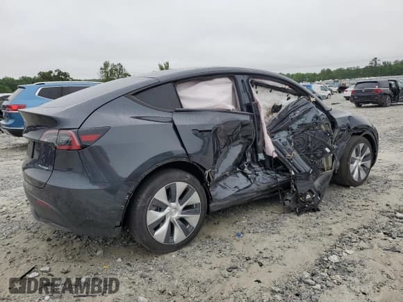 ✅ 2024 Tesla Model Y Long Range • VIN: 7SAYGAEE7RF005786 • Лот: 58415195. Опубликован ранее на Copart с пробегом 8 700 миль. Бесплатный доступ к архиву аукционных продаж из США и подробный отчёт об истории автомобиля на DreamBid. Изображение 3.