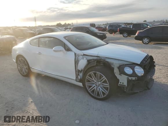 ✅ 2014 Bentley Continental GT • VIN: SCBFC7ZA8EC095924 • Lot: 87044205. Listed on Copart with 23,003 mi. Free auction sales archive from the USA and detailed vehicle history report at DreamBid. Image 4.
