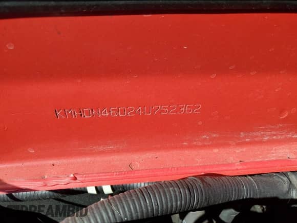 2004 Hyundai Elantra GLS z VIN KMHDN46D24U752362, wystawiony jako Copart lot #81528944 z przebiegiem 157 830 mil mil oraz Szkoda całkowita • Salvage title. Historia ofert i sprzedaży dostępna na DreamBid. Obrazek 13.