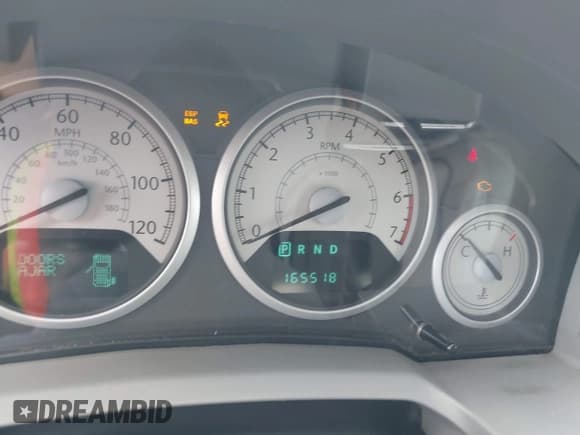 ✅ 2009 Chrysler Town & Country Limited • VIN: 2A8HR64X59R561518 • Lot: 41912572. Wystawiony na IAAI z przebiegiem 165 518 mil. Bezpłatny archiwum sprzedaży aukcyjnych z USA i szczegółowy raport historii pojazdu na DreamBid. Zdjęcie 7.