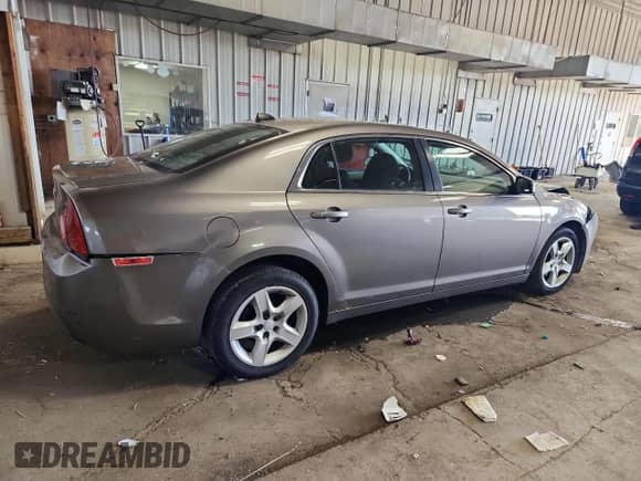 2012 Chevrolet Malibu 1LS с VIN 1G1ZB5E01CF267083, выставлен на аукционе Copart как лот 82617705 с пробегом 130 725 миль миль и На запчасти • Non repairable. История ставок и продаж доступна на DreamBid. Изображение 3.