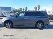 ✅ 2011 Honda Odyssey Touring • VIN: 5FNRL5H98BB063513 • Lot: 43599881. Listed on IAAI with 125,920 mi. Free auction sales archive from the USA and detailed vehicle history report at DreamBid. Image 14.