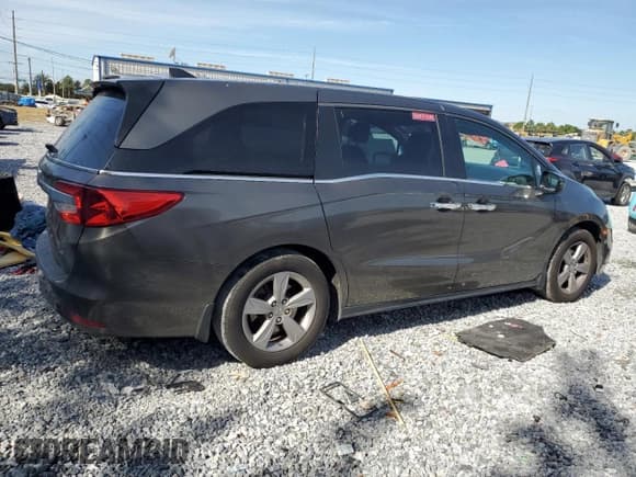 ✅ 2019 Honda Odyssey EX-L • VIN: 5FNRL6H78KB122497 • Лот: 92346185. Опубликован ранее на Copart с пробегом 235 218 миль. Бесплатный доступ к архиву аукционных продаж из США и подробный отчёт об истории автомобиля на DreamBid. Изображение 3.