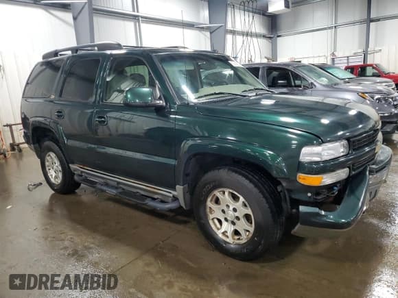 ✅ 2002 Chevrolet Tahoe LS • VIN: 1GNEK13Z02R299012 • Lot: 62668835. Listed on Copart with 168,405 mi. Free auction sales archive from the USA and detailed vehicle history report at DreamBid. Image 4.