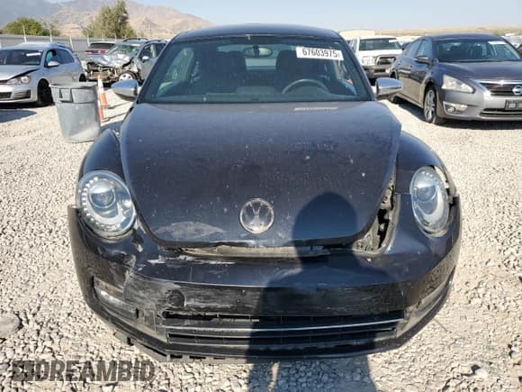 ✅ 2013 Volkswagen Beetle Turbo • VIN: 3VWVT7AT4DM686557 • Lot: 67603975. Wystawiony na Copart z przebiegiem 68 612 mil. Bezpłatny archiwum sprzedaży aukcyjnych z USA i szczegółowy raport historii pojazdu na DreamBid. Zdjęcie 5.