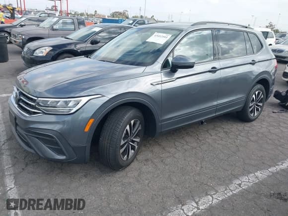 ✅ 2023 Volkswagen Tiguan S • VIN: 3VVRB7AX3PM028664 • Lot: 43412161. Listed on IAAI with 23,124 mi. Free auction sales archive from the USA and detailed vehicle history report at DreamBid. Image 2.