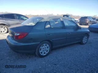 ✅ 2002 Kia Rio • VIN: KNADC123226128937 • Lot: 89225035. Listed on Copart with 218,436 mi. Free auction sales archive from the USA and detailed vehicle history report at DreamBid. Image 3.