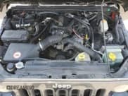 ✅ 2011 Jeep Wrangler Unlimited Sahara • VIN: 1J4BA5H15BL537765 • Лот: 64553855. Опубликован ранее на Copart с пробегом 194 140 миль. Бесплатный доступ к архиву аукционных продаж из США и подробный отчёт об истории автомобиля на DreamBid. Изображение 12.