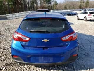 2017 Chevrolet Cruze LT z VIN 3G1BE6SM2HS549323, wystawiony jako Copart lot #68322312 z przebiegiem 121 635 mil mil oraz . Historia ofert i sprzedaży dostępna na DreamBid. Obrazek 6.