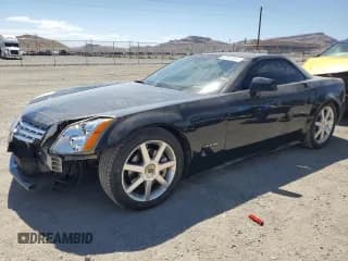 ✅ 2004 Cadillac XLR • VIN: 1G6YV34A345603061 • Lot: 67412674. Wystawiony na Copart z przebiegiem 88 335 mil. Bezpłatny archiwum sprzedaży aukcyjnych z USA i szczegółowy raport historii pojazdu na DreamBid. Zdjęcie 1.