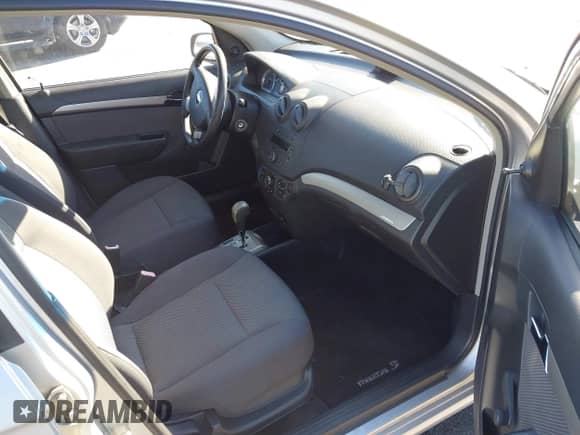 2007 Chevrolet Aveo LS z VIN KL1TD56657B150282, wystawiony jako IAAI lot #41416393 z przebiegiem 74 809 mil mil oraz . Historia ofert i sprzedaży dostępna na DreamBid. Obrazek 5.