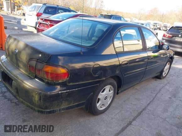 ✅ 2001 Chevrolet Malibu LS • VIN: 1G1NE52J916230914 • Lot: 43600812. Listed on IAAI with 117,653 mi. Free auction sales archive from the USA and detailed vehicle history report at DreamBid. Image 4.