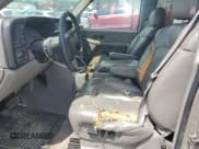 ✅ 1999 GMC Sierra 1500 SLE • VIN: 2GTEK19T5X1512872 • Лот: 65164465. Опубликован ранее на Copart с пробегом 163 220 миль. Бесплатный доступ к архиву аукционных продаж из США и подробный отчёт об истории автомобиля на DreamBid. Изображение 7.