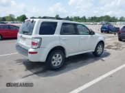 ✅ 2011 Mercury Mariner • VIN: 4M2CN8B74BKJ02345 • Lot: 42527017. Wystawiony na IAAI z przebiegiem 188 023 mil. Bezpłatny archiwum sprzedaży aukcyjnych z USA i szczegółowy raport historii pojazdu na DreamBid. Zdjęcie 4.