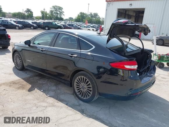 ✅ 2017 Ford Fusion Hybrid Titanium • VIN: 3FA6P0RU2HR360481 • Лот: 42902061. Опубликован ранее на IAAI с пробегом 88 086 миль. Бесплатный доступ к архиву аукционных продаж из США и подробный отчёт об истории автомобиля на DreamBid. Изображение 3.