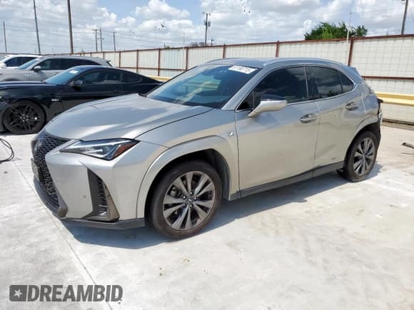 ✅ 2022 Lexus UX 250h F Sport • VIN: JTHR9JBH1N2057419 • Лот: 61190715. Опубликован ранее на Copart с пробегом 60 401 миль. Бесплатный доступ к архиву аукционных продаж из США и подробный отчёт об истории автомобиля на DreamBid. Изображение 1.