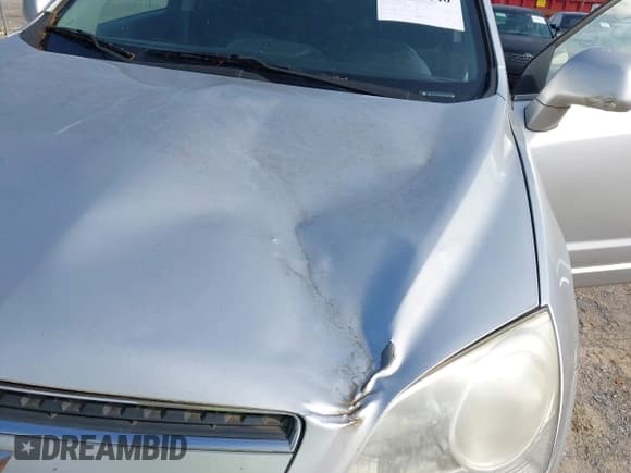 ✅ 2013 Chevrolet Captiva Sport LT • VIN: 3GNAL3EK1DS568948 • Lot: 42501040. Wystawiony na IAAI z przebiegiem 165 721 mil. Bezpłatny archiwum sprzedaży aukcyjnych z USA i szczegółowy raport historii pojazdu na DreamBid. Zdjęcie 6.