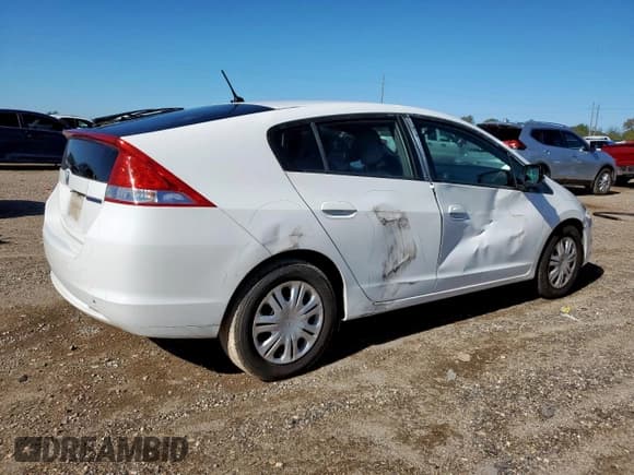✅ 2011 Honda Insight LX • VIN: JHMZE2H59BS008401 • Лот: 90453615. Опубликован ранее на Copart с пробегом 136 962 миль. Бесплатный доступ к архиву аукционных продаж из США и подробный отчёт об истории автомобиля на DreamBid. Изображение 3.