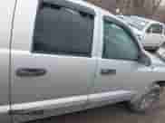 2005 Dodge Dakota Laramie with VIN 1D7HE58N05S244878, listed as a IAAI auction lot 41662513 with 171,323 mi miles and . Bid and sale history available at DreamBid. Image 13.